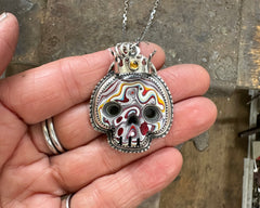 Fordite Skull with Citrine